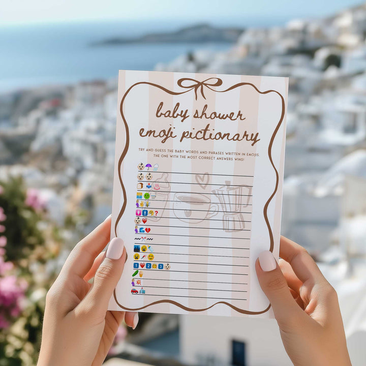 Elegant and minimal design baby shower activity cards held in a hand, showcasing fun and editable templates for new parents and guests.