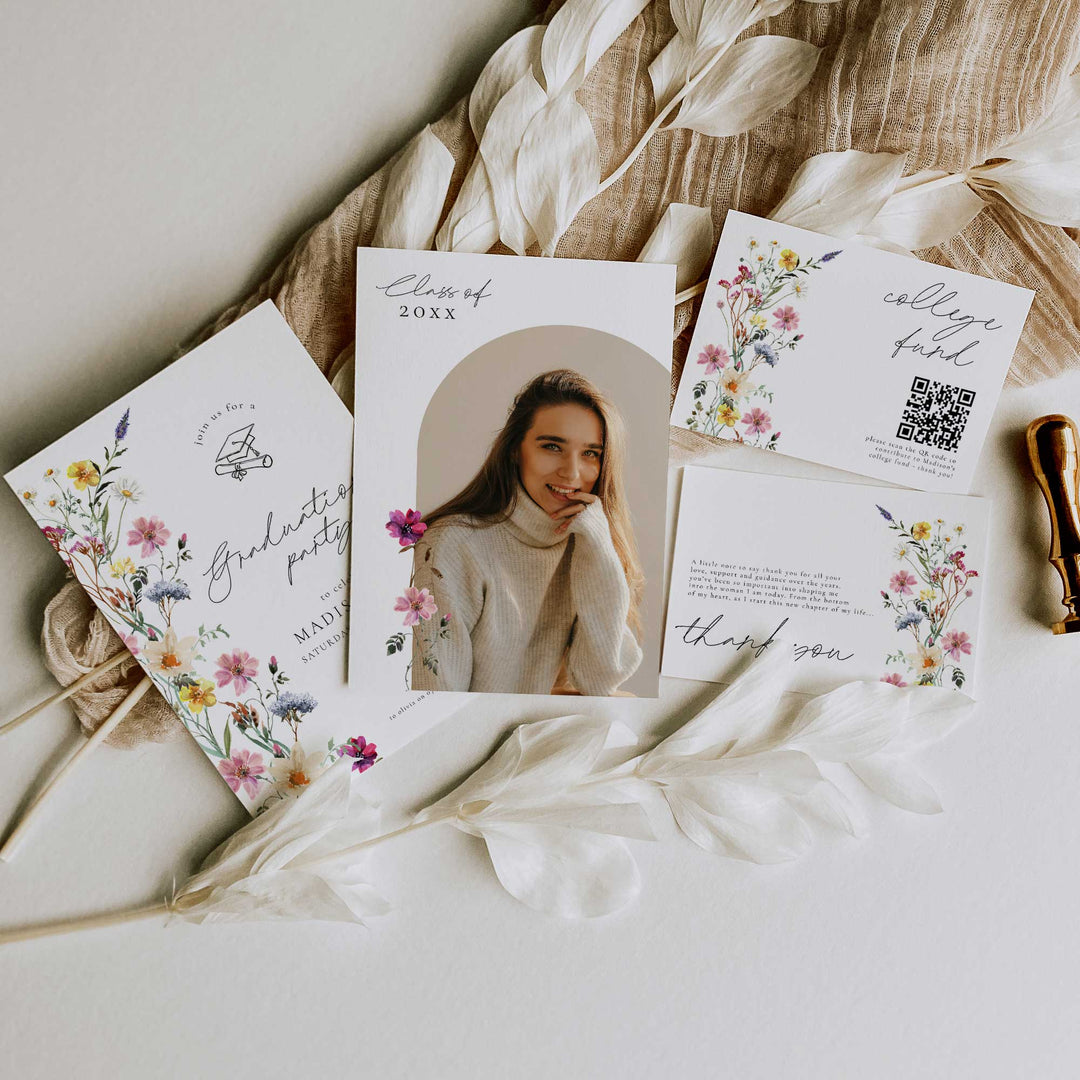 Graduation-themed cards with floral designs and a photo of a smiling person on a textured surface.
