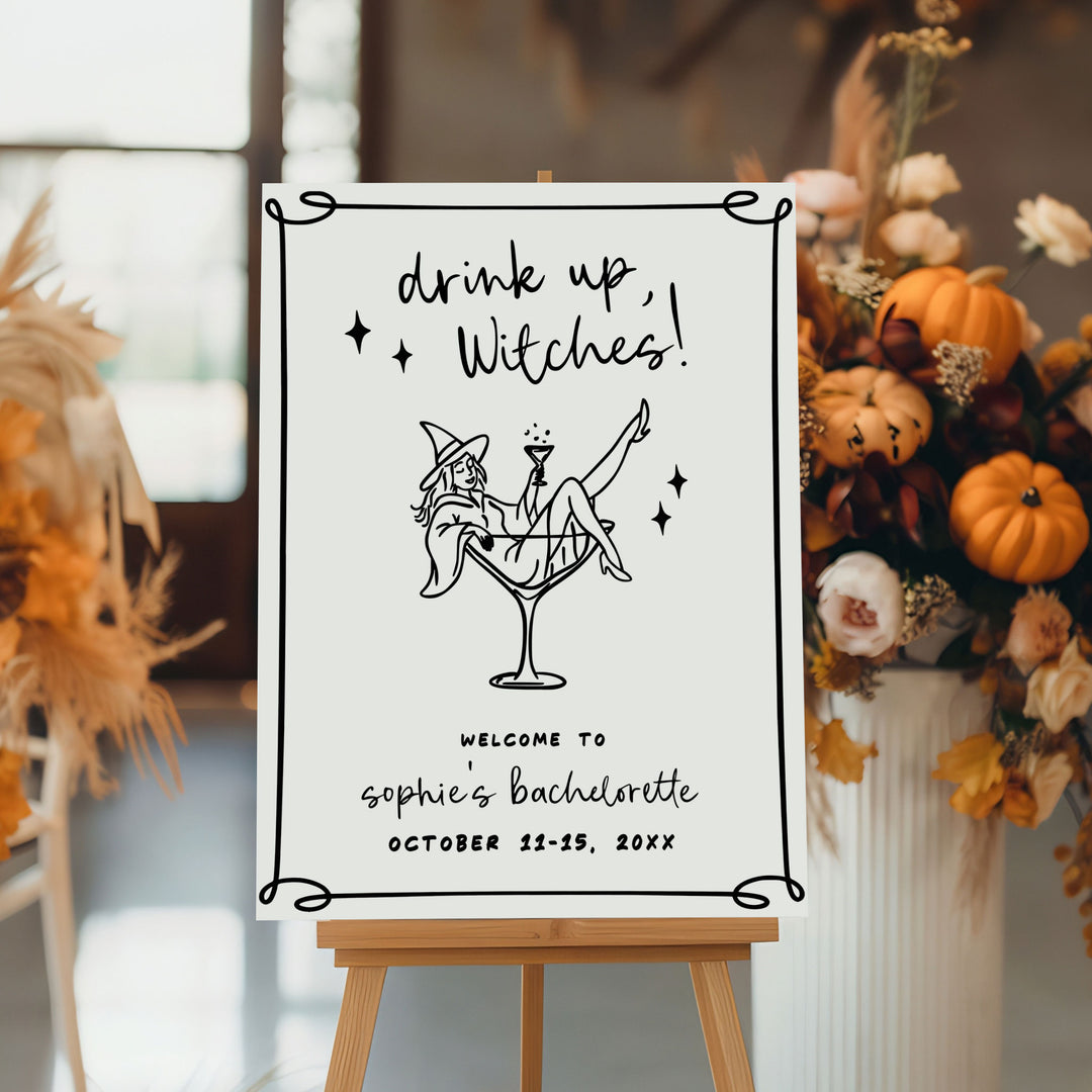 Custom spooky welcome board featuring witch bride art and stars, perfect for October weddings or themed girls getaways.
