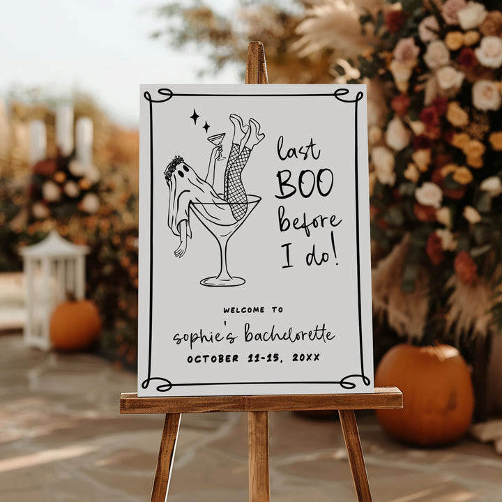 Printable spooky bridal shower decor featuring a sassy ghost with a martini, ideal for Halloween-loving brides-to-be