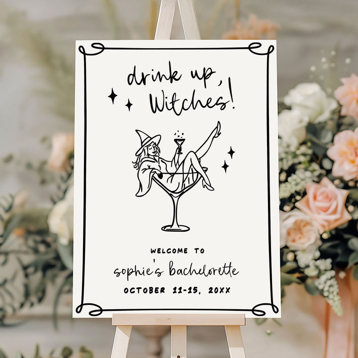Halloween witch party decor with sparkling martini and sexy witch illustration, ideal for bridal showers or spooky hen parties.