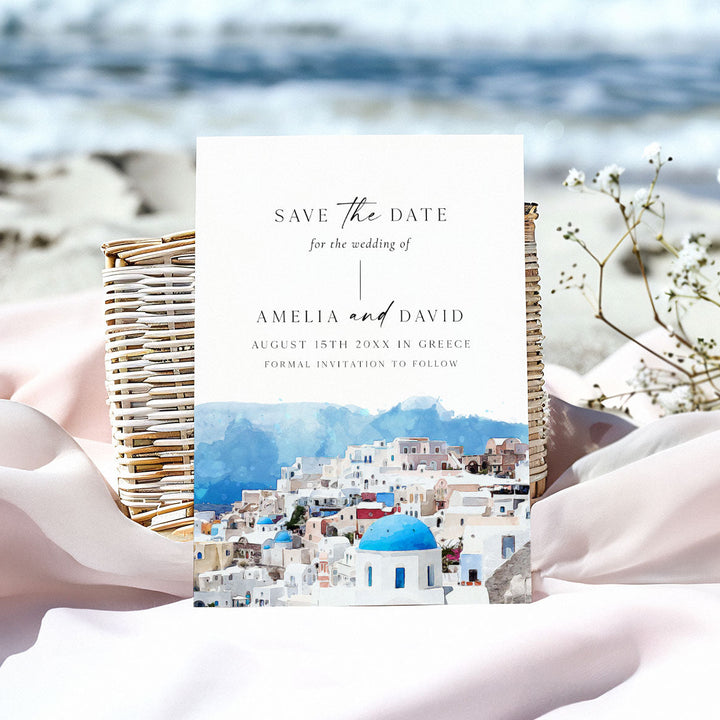 Save the date card for a wedding in Greece with a scenic background.
