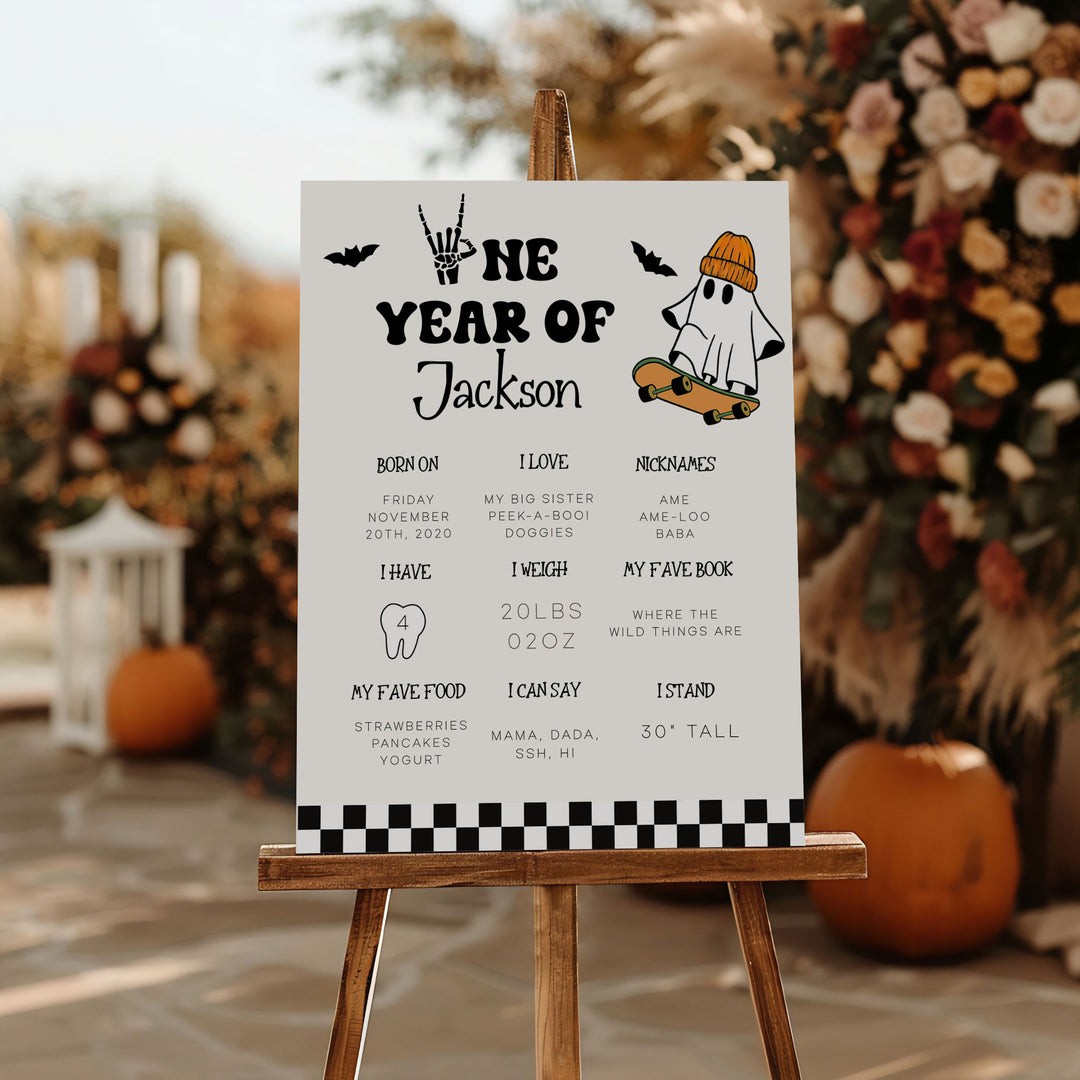 Editable Spooky Dude 1st birthday sign featuring custom baby stats and skateboard ghost design, perfect for Halloween party decor.