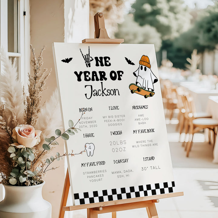 Customizable milestone birthday sign with black-and-white checkered border and spooky details, made for Halloween-loving families.