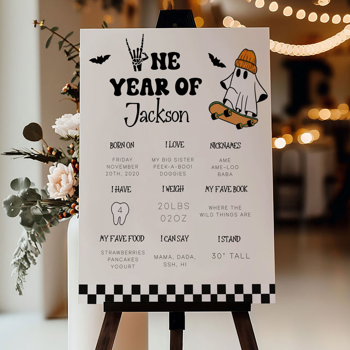Spooky 1st birthday keepsake poster showing baby’s favorite things and stats, great for a boo-day celebration or party display.