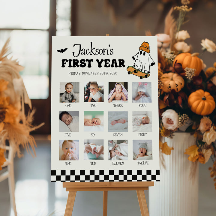 Halloween baby photo collage board with ghost on skateboard, displays monthly baby photos from newborn to 12 months.
