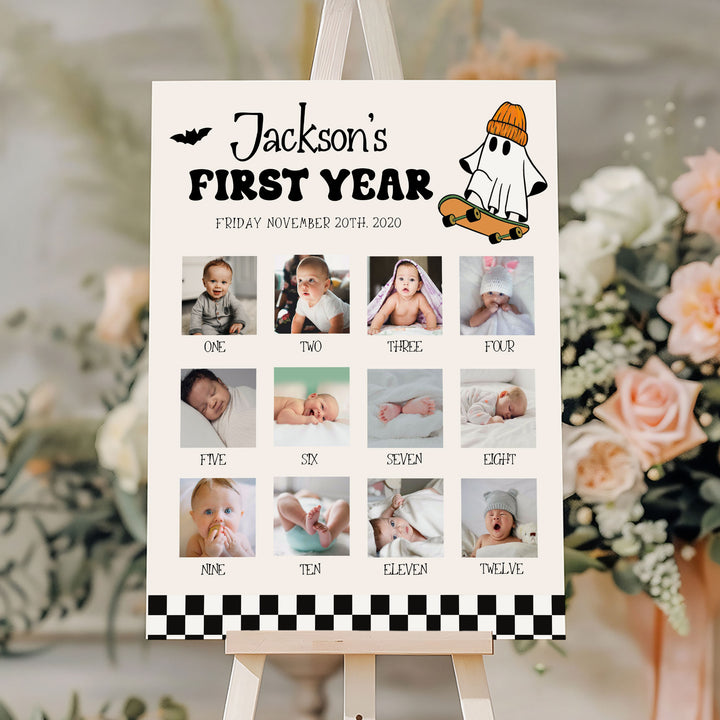 Halloween-themed baby milestone board with gold and silver balloons, perfect for fall first birthday celebrations or keepsakes.