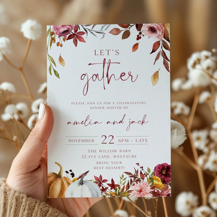 Custom Thanksgiving party invitation card with hand-lettered “Let’s Gather” and seasonal pumpkin graphics.