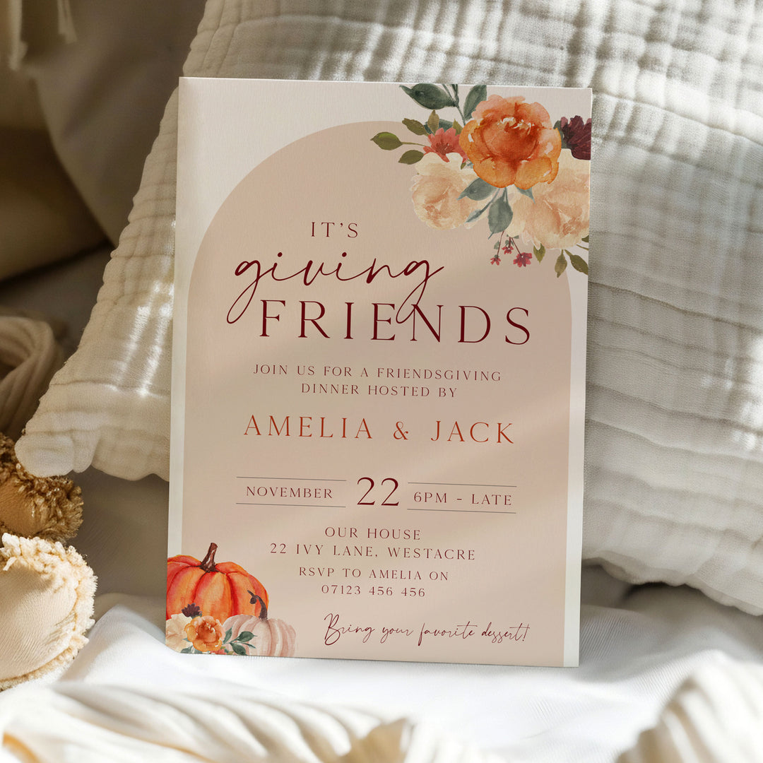 Stylish arch-style invite with floral details and RSVP information, designed for fall parties or Friendsgiving events.
