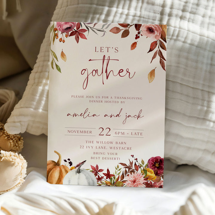 Thanksgiving dinner invitation card with watercolor pumpkins and florals, perfect for fall gatherings and holiday events.
