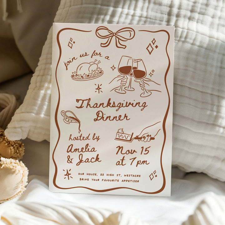 Neutral-toned background highlights a brown illustrated border and text, capturing the essence of a warm fall celebration.