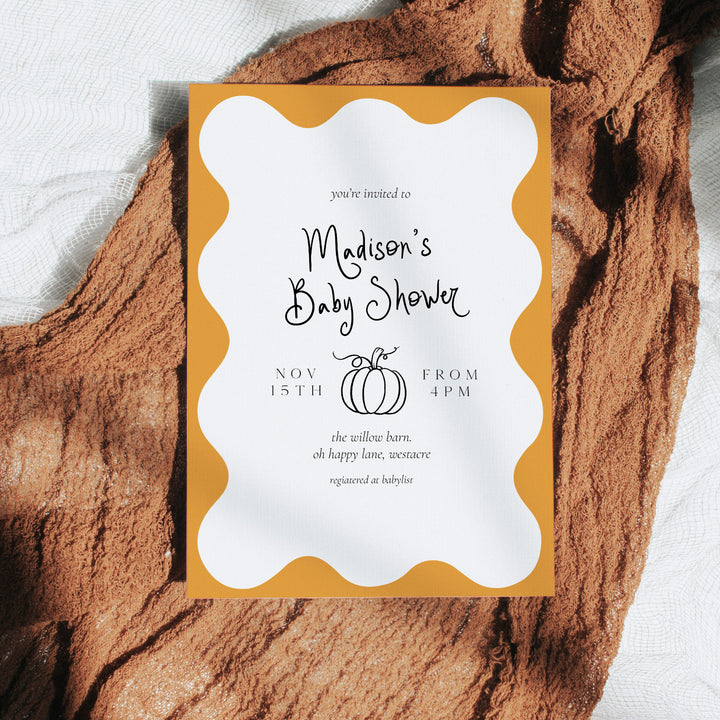 Pumpkin Orange Wavy Baby Shower Invitation editable template in Canva