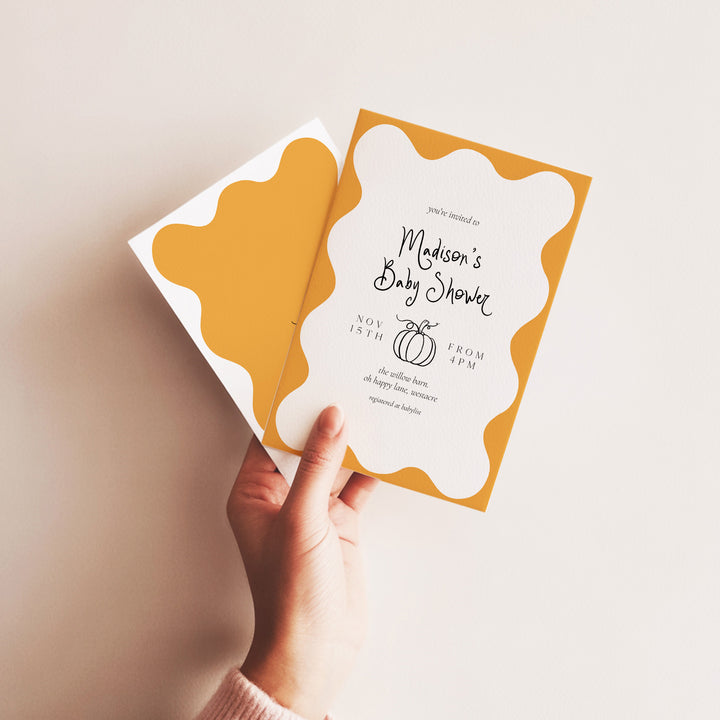 Pumpkin Orange Wavy Baby Shower Invitation editable template in Canva