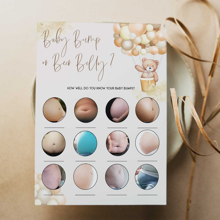 Fully editable and printable baby shower baby bump or beer belly game with a hot air balloon teddy bear, we can bearly wait design. Perfect for a We Can Bearly Wait baby shower themed party