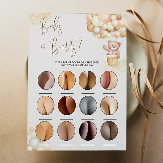 Fully editable and printable baby shower boobs or butts game with a hot air balloon teddy bear, we can bearly wait design. Perfect for a We Can Bearly Wait baby shower themed party