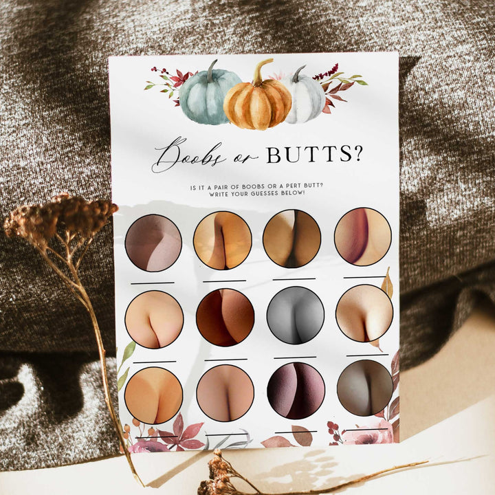 Fully editable and printable baby shower boobs or butts game with a fall pumpkin design. Perfect for a Fall Pumpkin baby shower themed party
