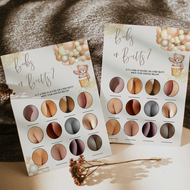 Fully editable and printable baby shower boobs or butts game with a hot air balloon teddy bear, we can bearly wait design. Perfect for a We Can Bearly Wait baby shower themed party