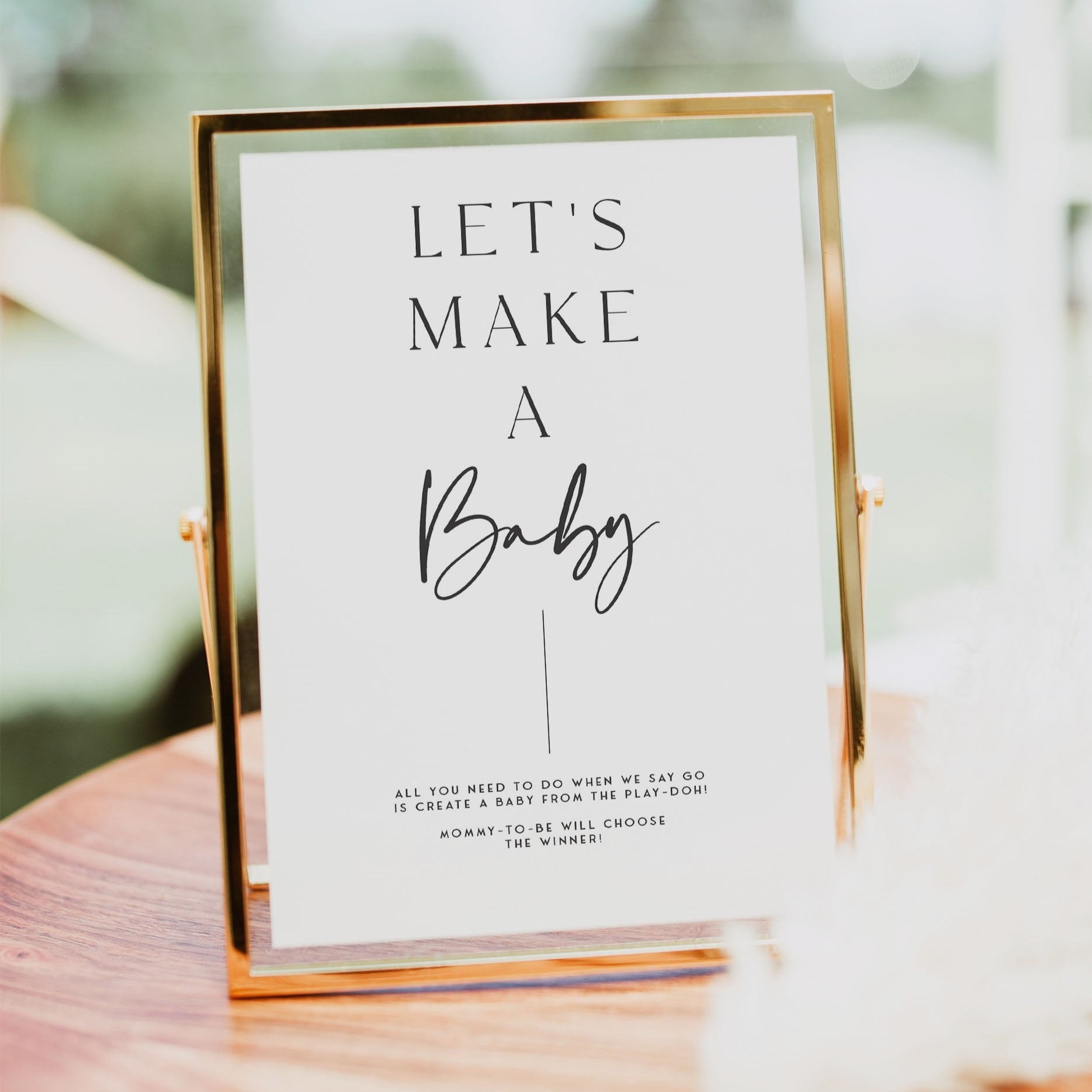 Printable baby shower game Let's Make A Baby with a modern minimalist design
