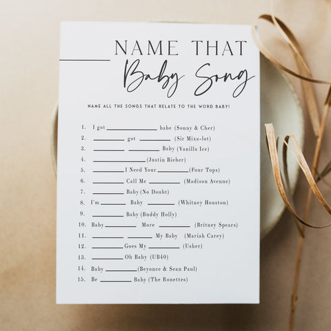 Printable baby shower game Name That Baby Song with a modern minimalist design