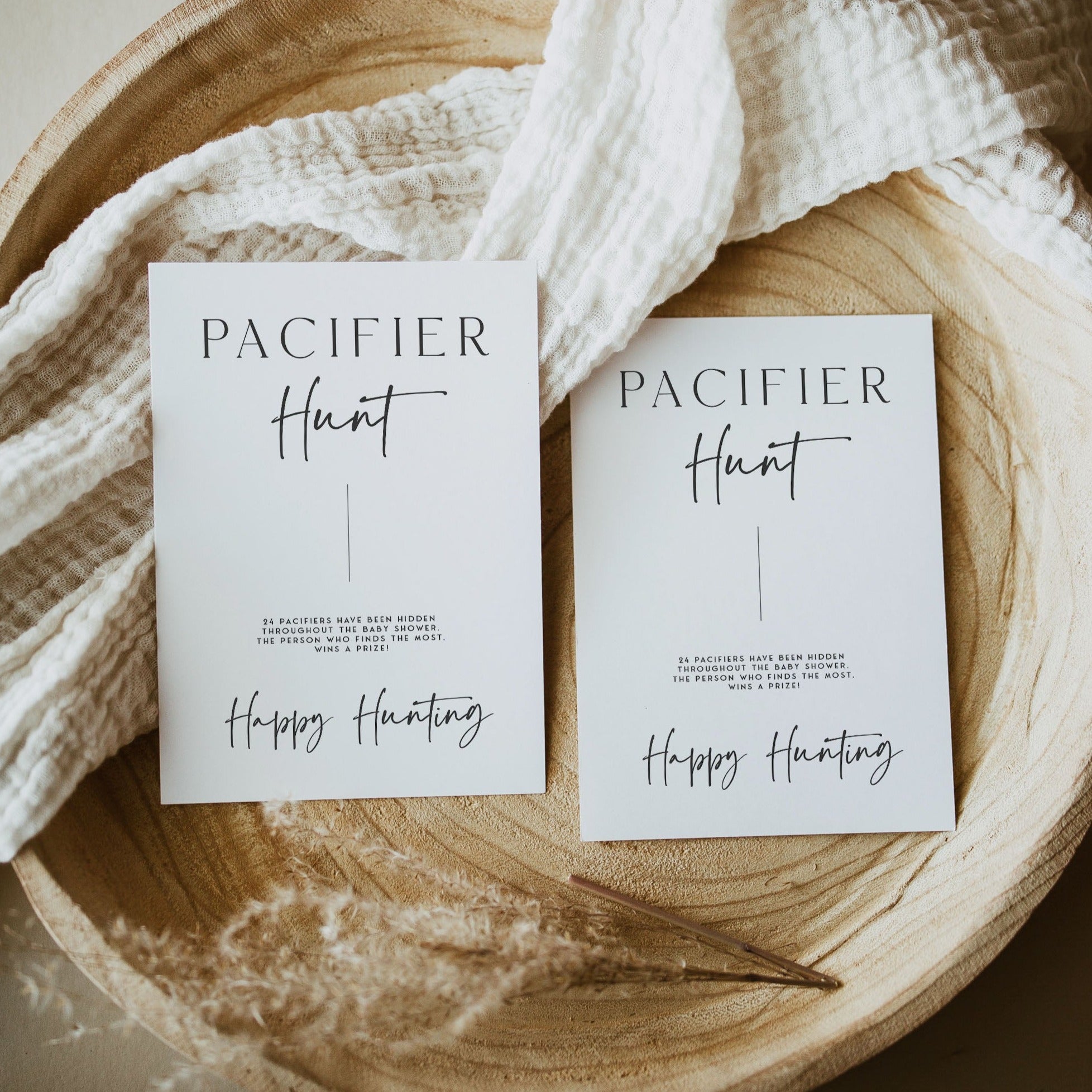 Printable baby shower game Pacifier Hunt with a modern minimalist design