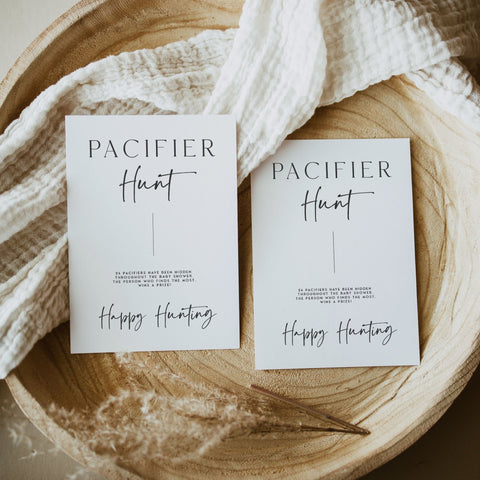 Printable baby shower game Pacifier Hunt with a modern minimalist design