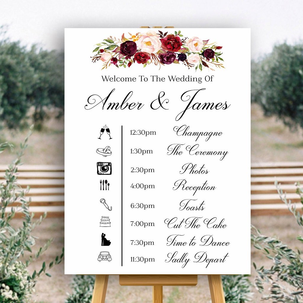Wedding event timeline sign in white with marsala flowers