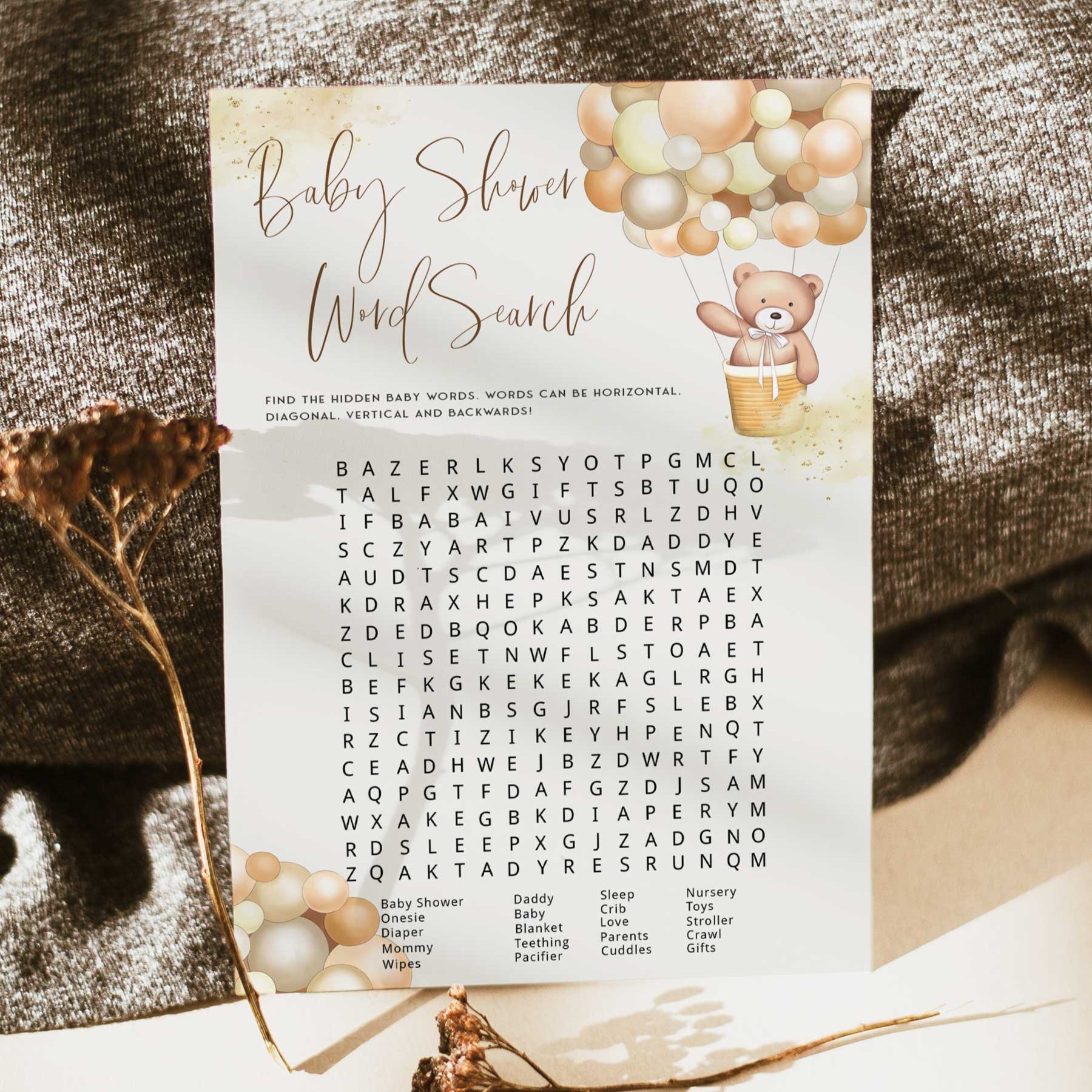 Fully editable and printable baby shower word search game with a hot air balloon teddy bear, we can bearly wait design. Perfect for a We Can Bearly Wait baby shower themed party