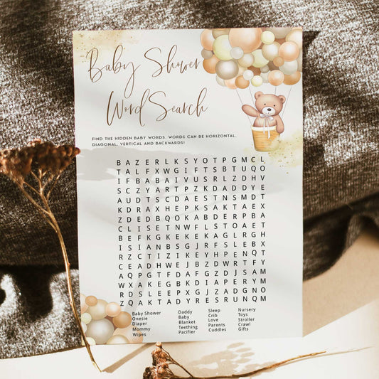 Fully editable and printable baby shower word search game with a hot air balloon teddy bear, we can bearly wait design. Perfect for a We Can Bearly Wait baby shower themed party