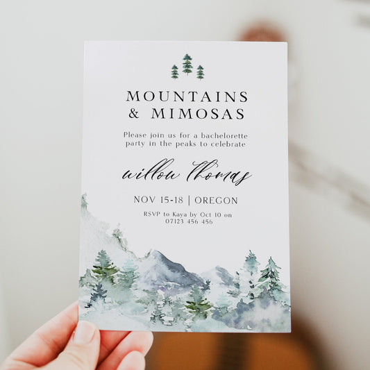 Fully editable and printable mountains & mimosa invitation with a mountain design. Perfect for a snowy cabin mountain bridal shower