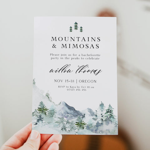 Fully editable and printable mountains & mimosa invitation with a mountain design. Perfect for a snowy cabin mountain bridal shower