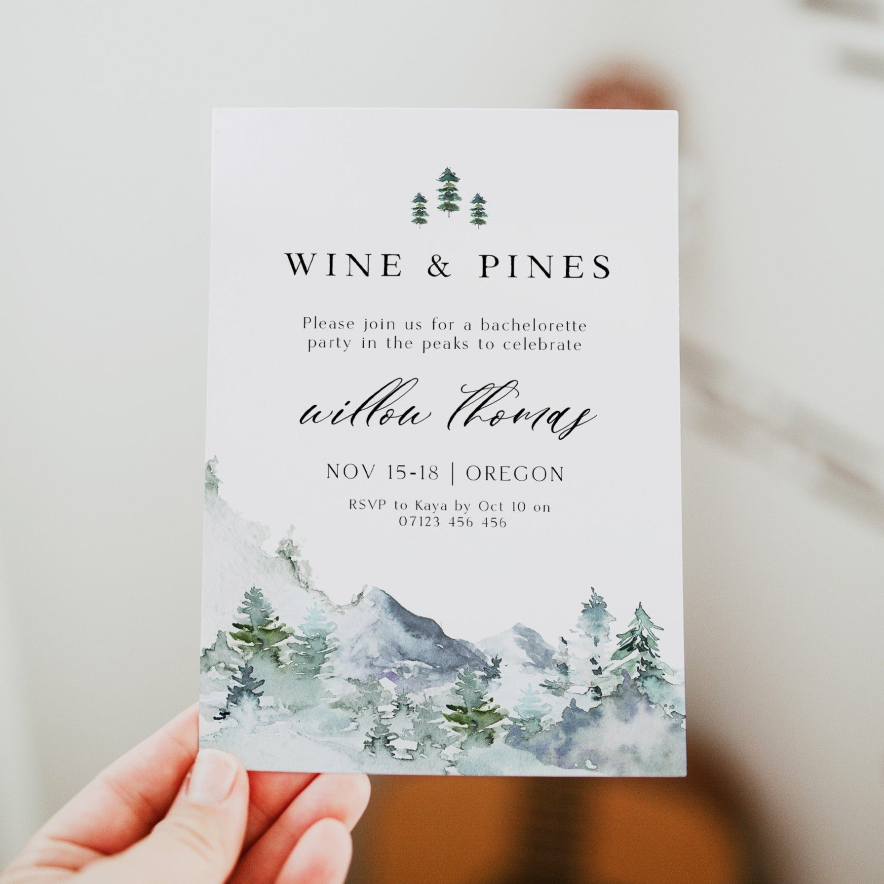 Fully editable and printable wine and pines invitation with a mountain design. Perfect for a snowy cabin mountain bridal shower