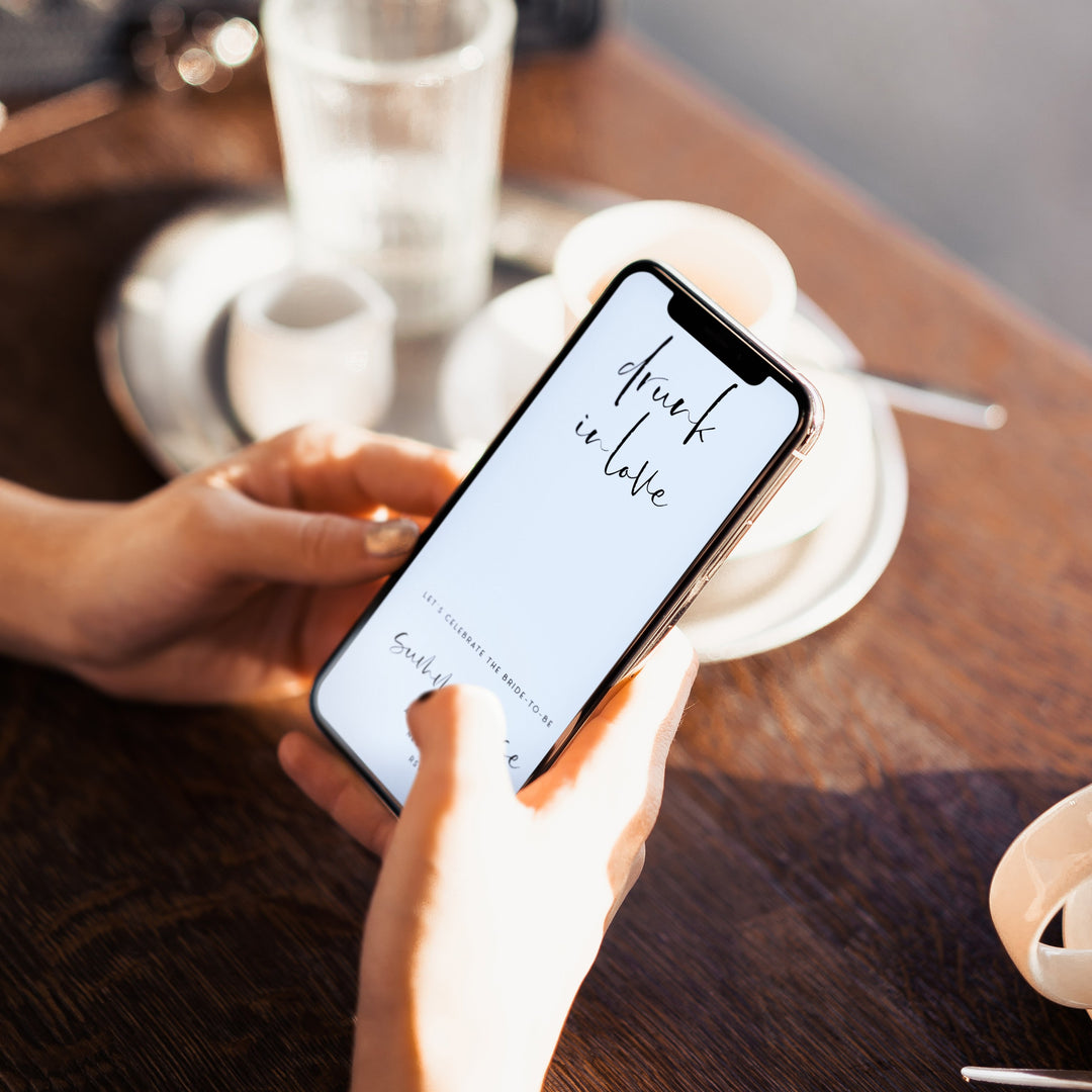 Fully editable Drunk In Love mobile invitation with a modern minimalist design. Perfect for a modern simple bridal shower themed party