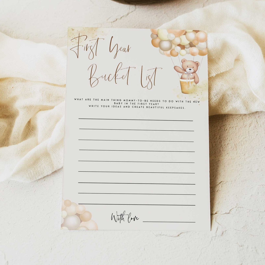Fully editable and printable baby shower first year bucket list game with a hot air balloon teddy bear, we can bearly wait design. Perfect for a We Can Bearly Wait baby shower themed party
