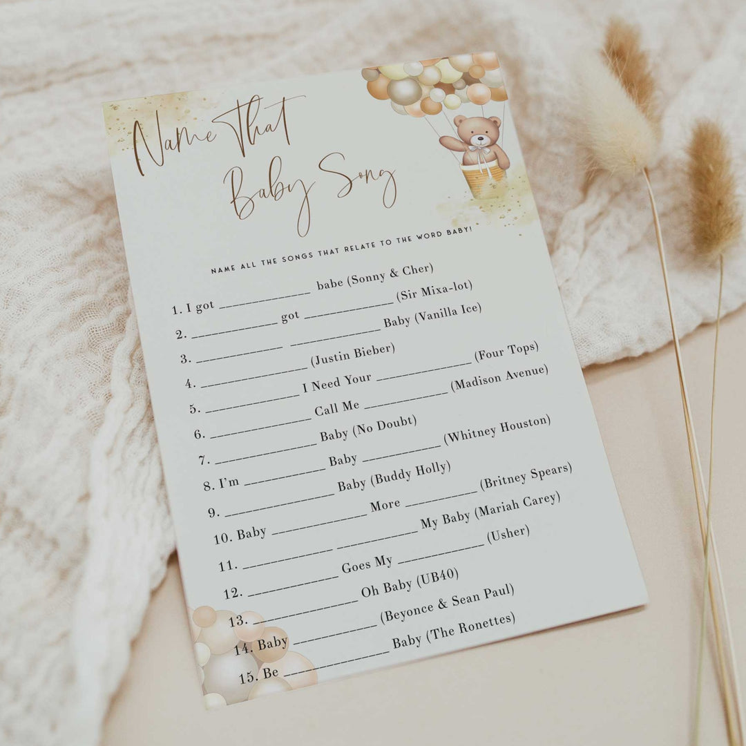 Fully editable and printable baby shower name that baby song game with a hot air balloon teddy bear, we can bearly wait design. Perfect for a We Can Bearly Wait baby shower themed party