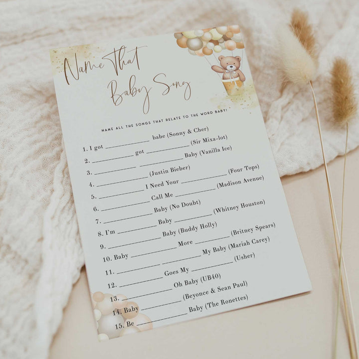 Fully editable and printable baby shower name that baby song game with a hot air balloon teddy bear, we can bearly wait design. Perfect for a We Can Bearly Wait baby shower themed party