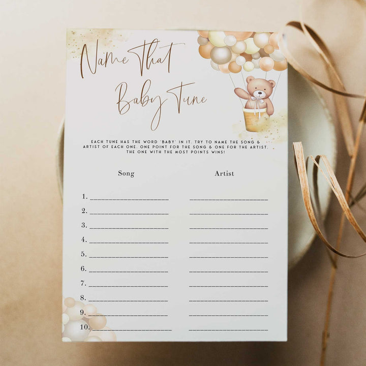 Fully editable and printable baby shower name that baby tune game with a hot air balloon teddy bear, we can bearly wait design. Perfect for a We Can Bearly Wait baby shower themed party