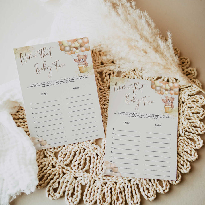 Fully editable and printable baby shower name that baby tune game with a hot air balloon teddy bear, we can bearly wait design. Perfect for a We Can Bearly Wait baby shower themed party