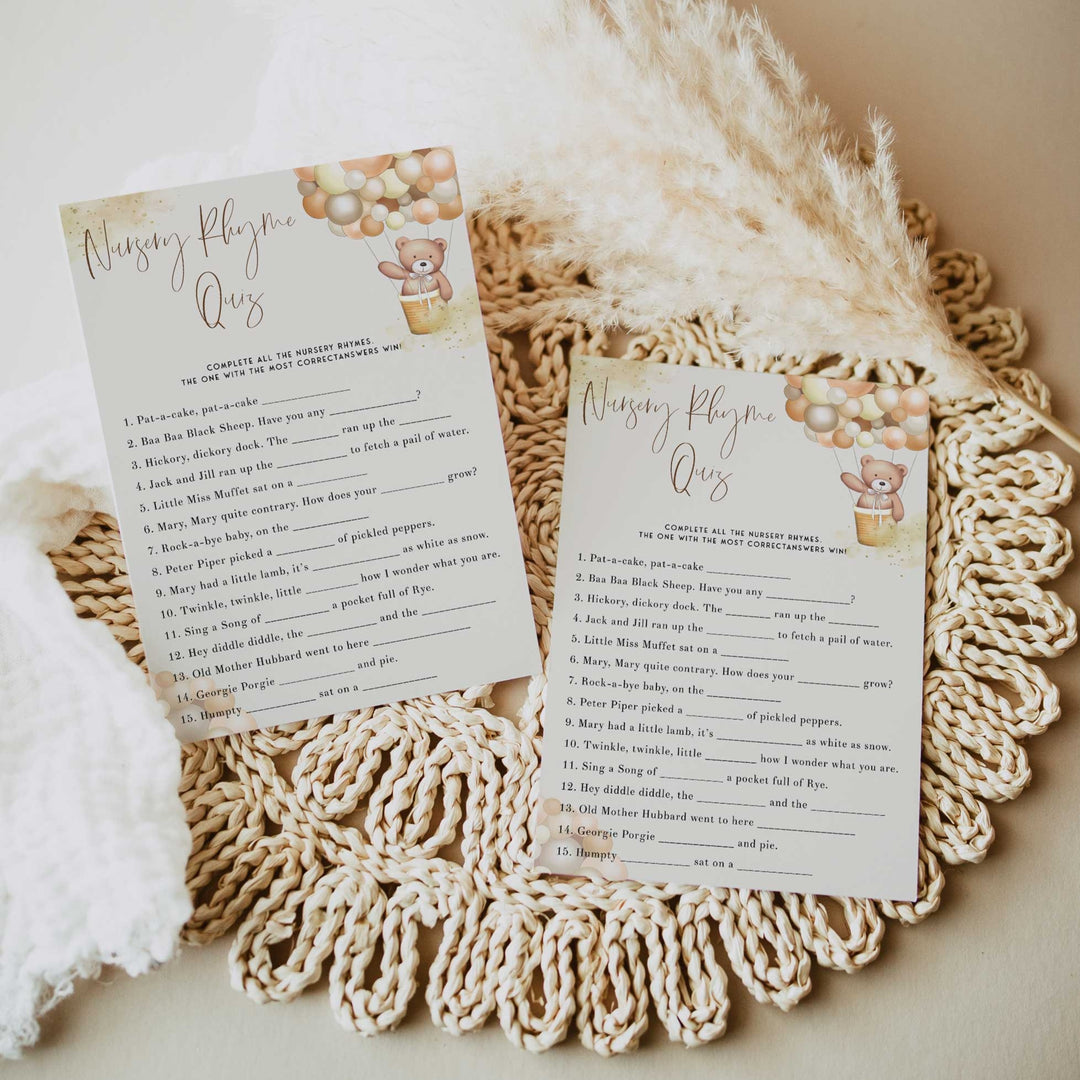 Fully editable and printable baby shower nursery rhyme quiz game with a hot air balloon teddy bear, we can bearly wait design. Perfect for a We Can Bearly Wait baby shower themed party