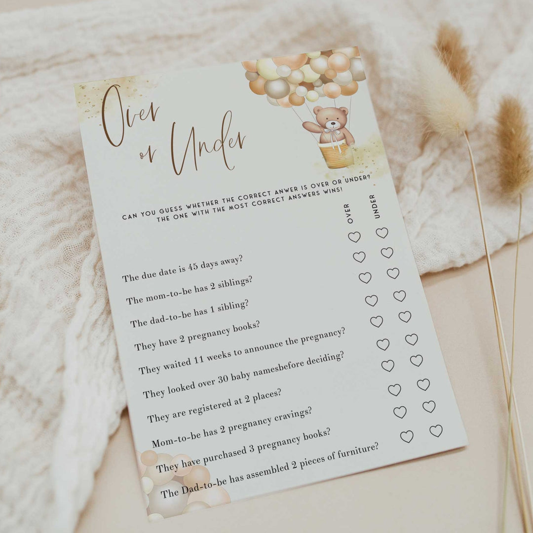 Fully editable and printable baby shower over or under game with a hot air balloon teddy bear, we can bearly wait design. Perfect for a We Can Bearly Wait baby shower themed party