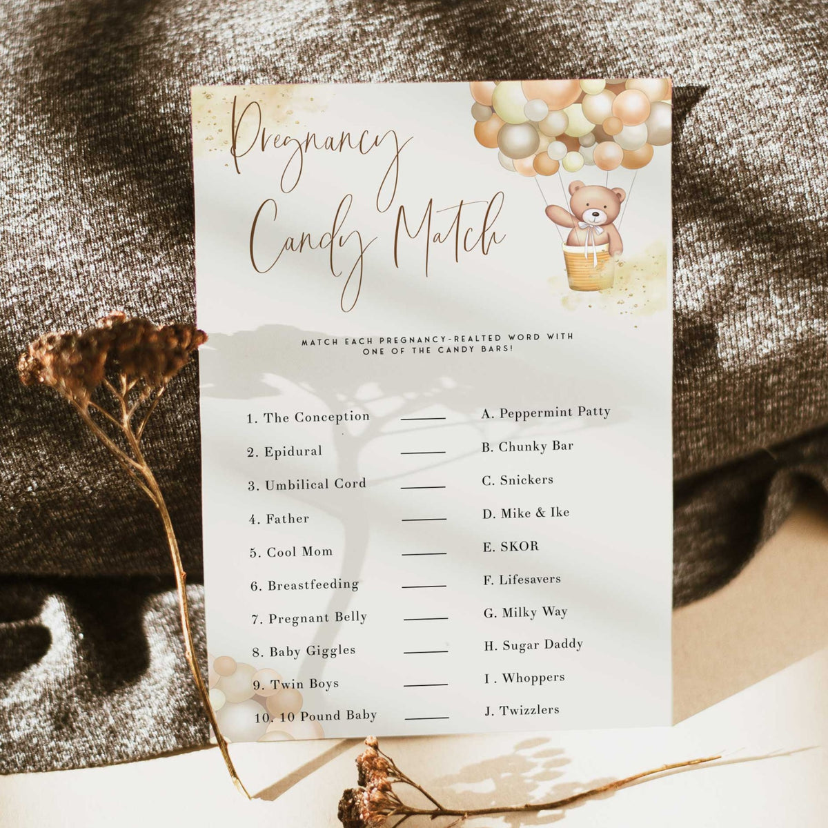 Fully editable and printable baby shower pregnancy candy match game with a hot air balloon teddy bear, we can bearly wait design. Perfect for a We Can Bearly Wait baby shower themed party