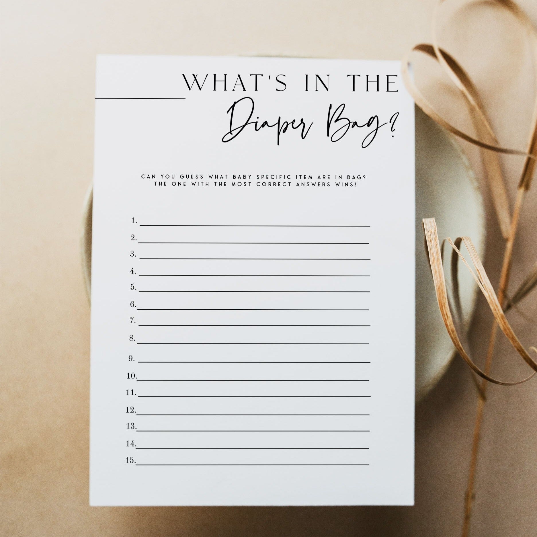 Printable baby shower game What's In The Diaper Bag with a modern minimalist design