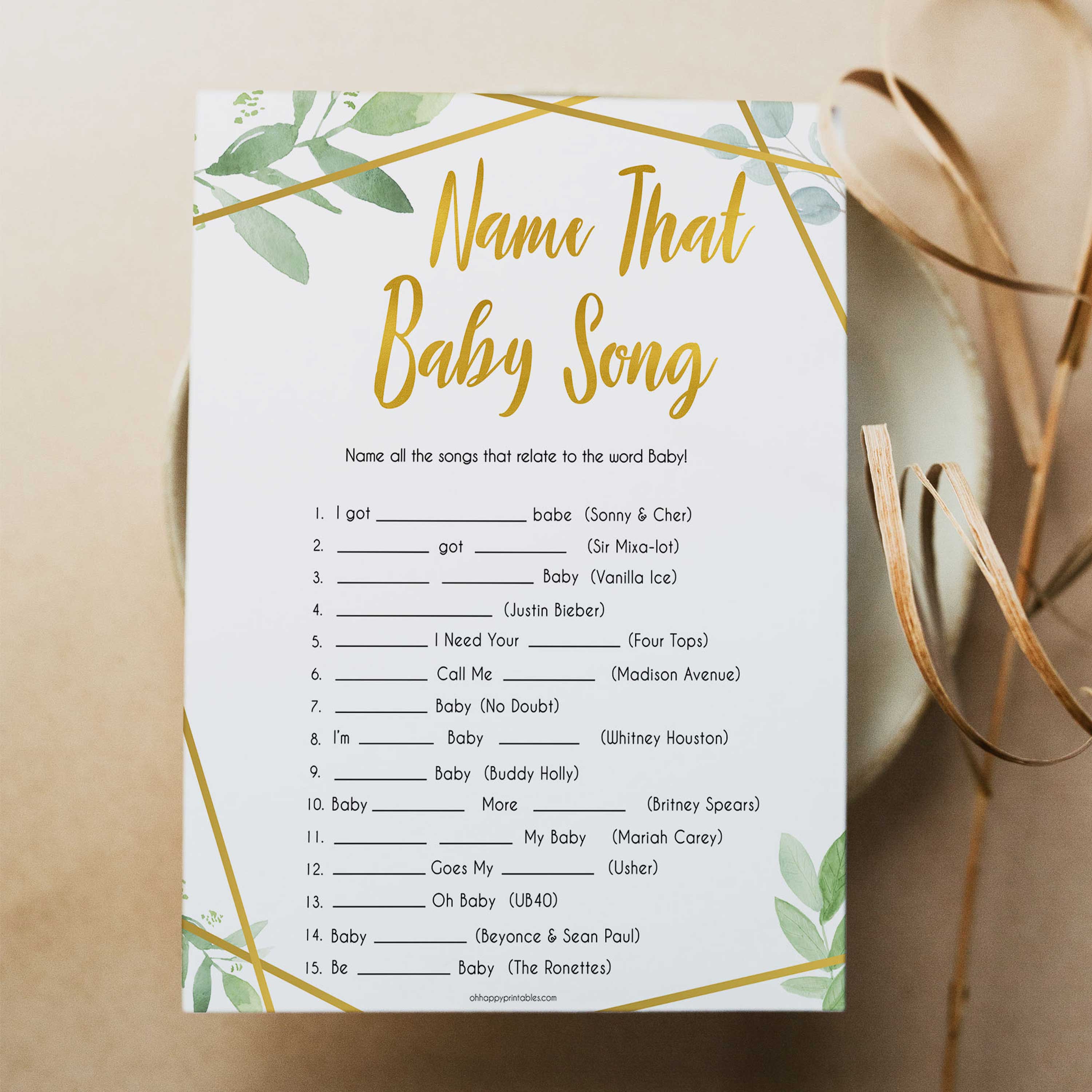 gold geometric name that baby song baby shower games, printable baby shower games, fun baby games, popular baby games, gold baby games