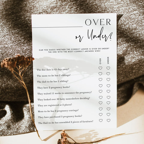 Printable baby shower game Over or Under with a modern minimalist design