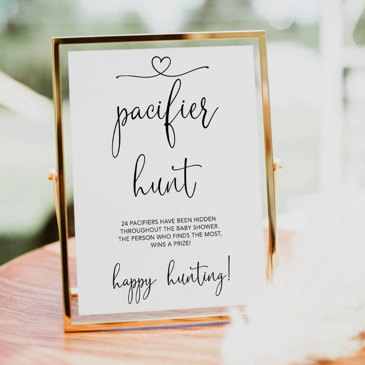 Minimalist baby shower games, pacifier hunt baby games, 10 baby game bundles, fun baby games, printable baby games, top baby games, popular baby games, labor or porn games, neutral baby games, gender reveal games