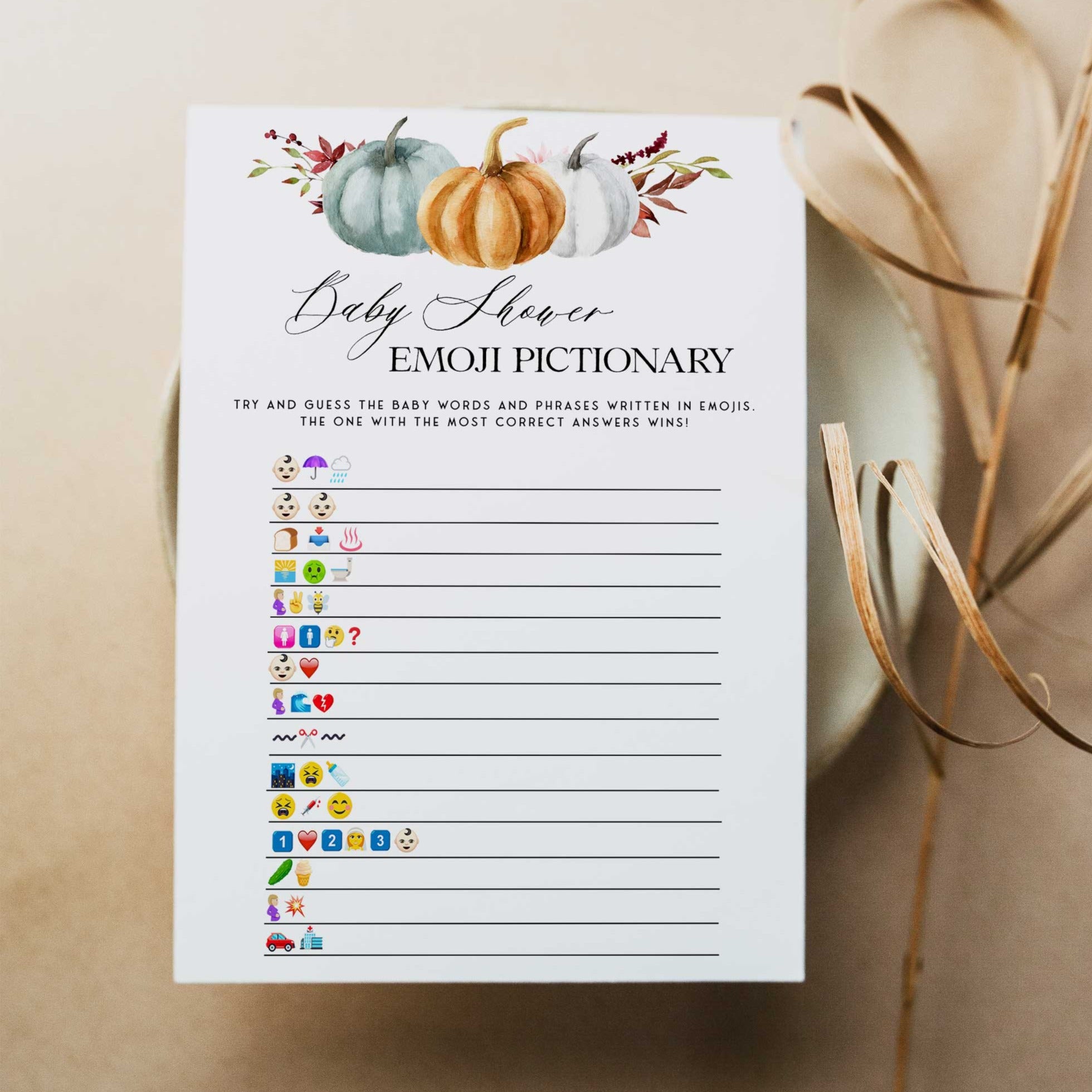 Fully editable and printable baby shower emoji pictionary game with a fall pumpkin design. Perfect for a Fall Pumpkin baby shower themed party