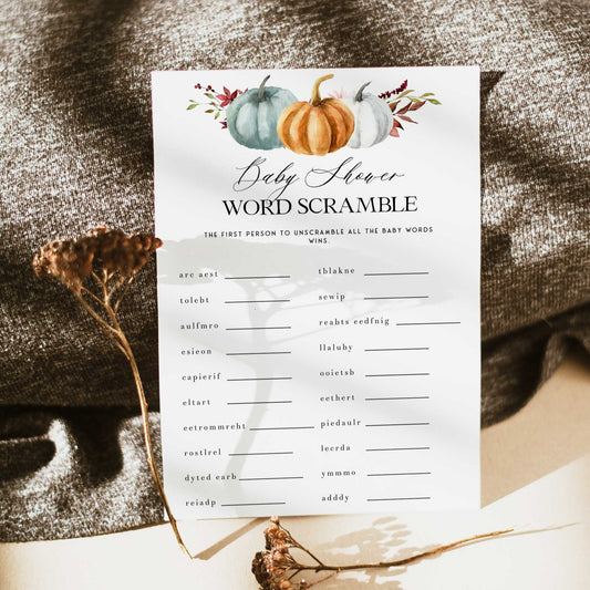 Fully editable and printable baby shower word scramble game with a fall pumpkin design. Perfect for a Fall Pumpkin baby shower themed party