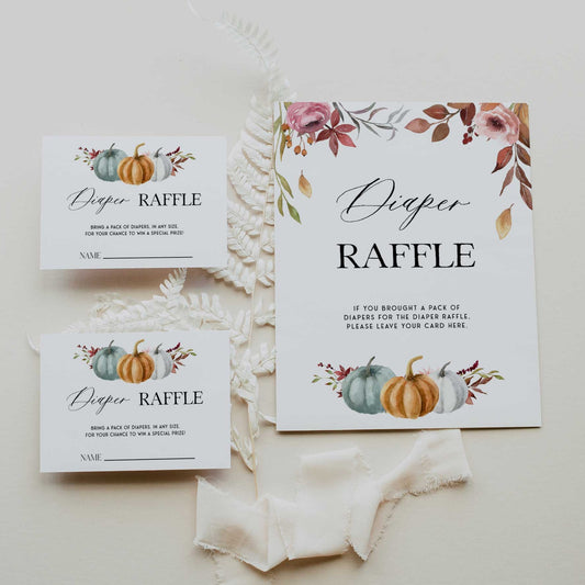 Fully editable and printable baby shower diaper raffle game with a fall pumpkin design. Perfect for a Fall Pumpkin baby shower themed party