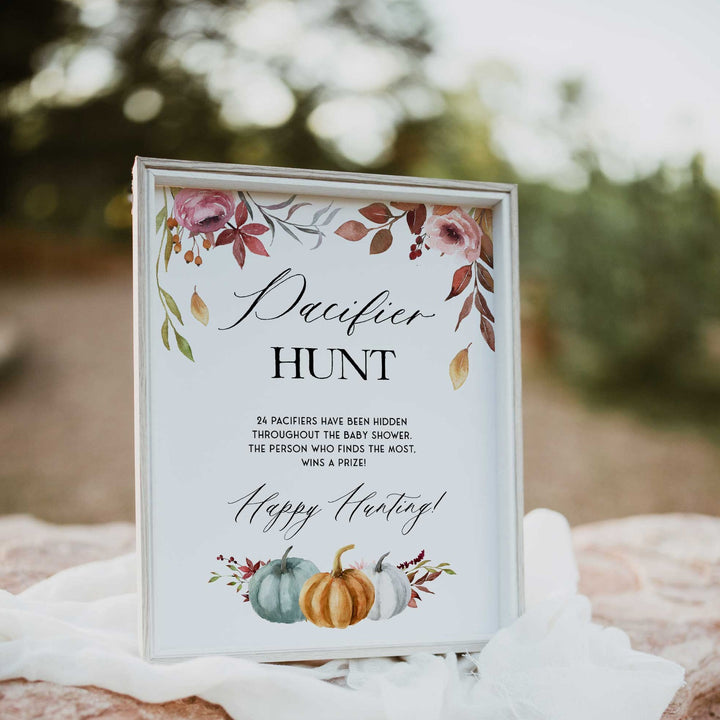 Fully editable and printable baby shower pacifier hunt game with a fall pumpkin design. Perfect for a Fall Pumpkin baby shower themed party