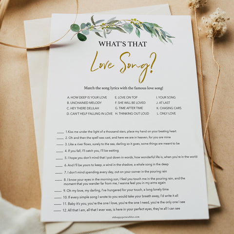 Bridal Shower game What’s that Love Song, with a gold and eucalyptus greenery design