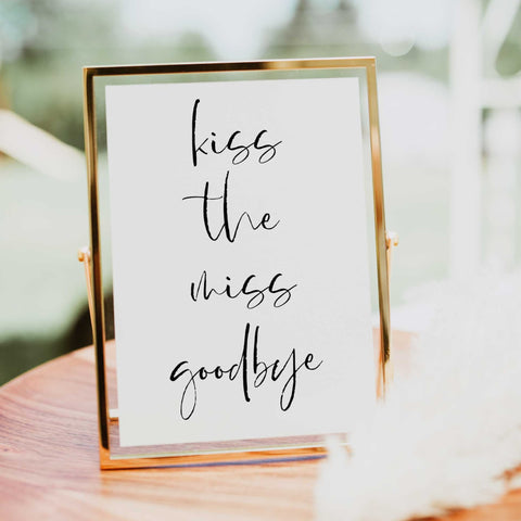Fully editable and printable bridal shower kiss the miss goodbye game with a modern minimalist design. Perfect for a modern simple bridal shower themed party